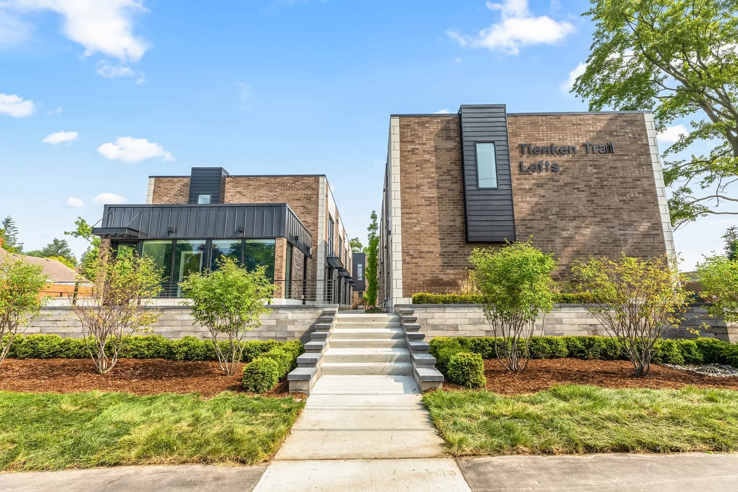 Exterior twilight view of completed Tienken Traillofts renovation in Royal Oak Michigan
